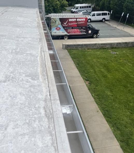 RCS gutter truck beside a commercial gutter run